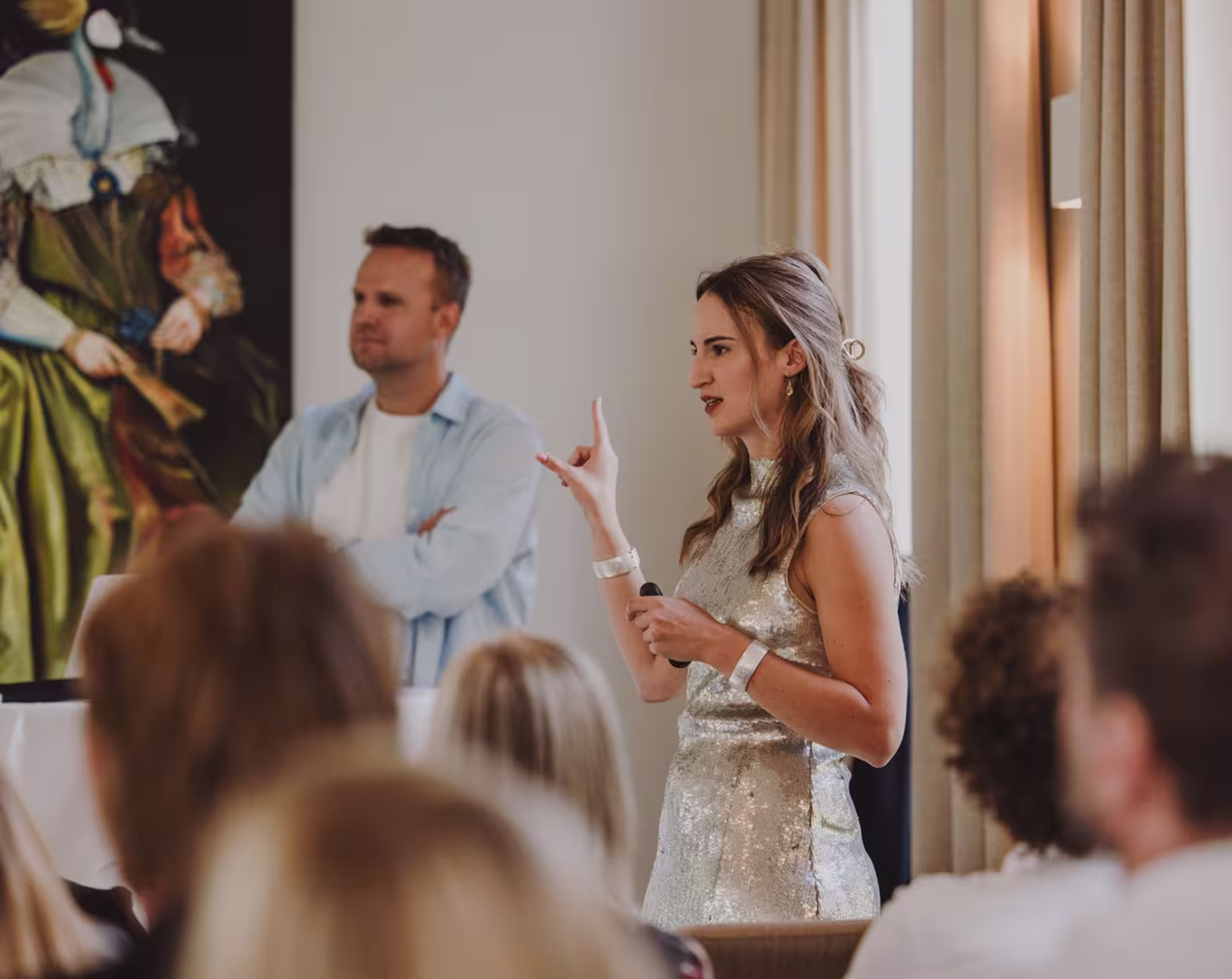 Olja and Pieter giving a speech on a conference
